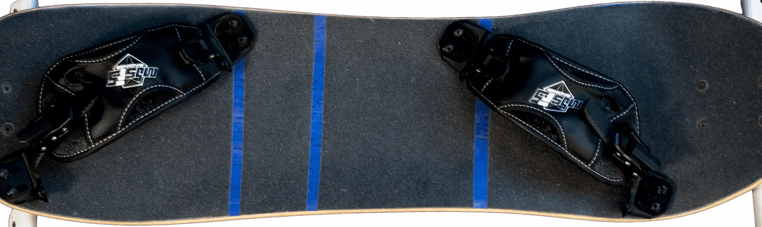 Mountainboard deck with foot bindings, top view.
